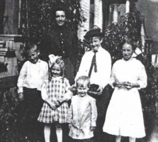 Mary Ann Rive, born in St Brelade in 1873, daughter of Philip (1835-1888) and Marguerite, nee Thoreau (1836-1884). After their deaths she emigrated to the USA in 1893 and married Nelson Bishop in Colorado in 1897. She is pictured with her five children