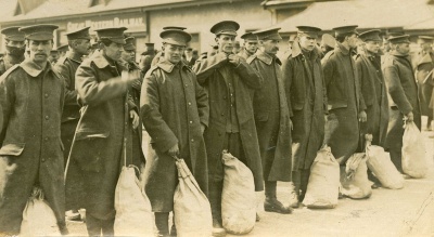 Jersey Contingent members with their kitbags