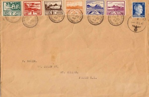 An envelope addressed to P Dreux in Queen Street in 1943. It bears a set of Jersey Occupation stamps and a German stamp