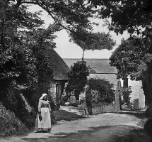 The old farm cottage with the new 1890s farmhouse in the background. Both were called Les Hougues, being one property