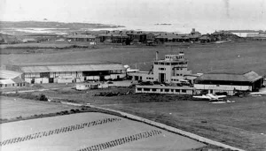 An aerial view of the Airport in 1948, with St Peter's Barracks in the background