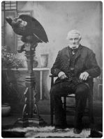 Jacques Alexandre (born May 27, 1827), son of Jean and Anne Malzard, married Elizabeth De Caen. He is sitting beside an eagle pulpit which he carved for St Ouen's Parish Church