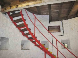 The stairs from the first to second floors