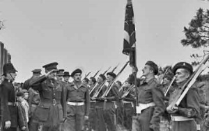 Saluting the returning Militia colours in 1946