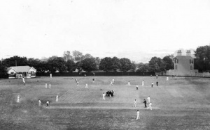 A cricket match in progress on College Field