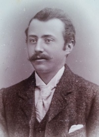 An unknown family member photographed by T Price in 1897