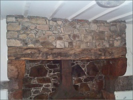 A fireplace which was found buried in a wall