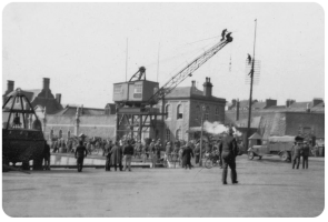 A crane being moved from the Albert Pier to the Victoria Pier in 1932