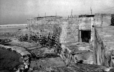 The original coastal tower, known as High Tower, was demolished to build the new defensive installation, manned by four NCOs and 15 men, covering the centre of the bay against attack by sea, land and air.