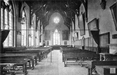The main hall in use as classrooms with a curtain screen to divide sections