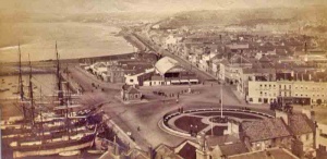 This picture dates to between 1888 and early 1890, because the circular gardens have been laid out, but the Statue of Queen Victoria, which was unveiled in the centre of 3 September 1890 is not yet in place