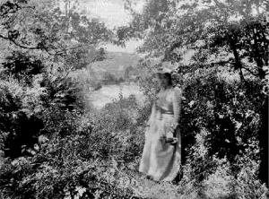 Woman at Greve de Lecq by an unknown photographer