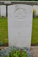The grave of Great War casualty Ernest Rolland Touzel (1892-1917) at Bapaume Australian Cemetery