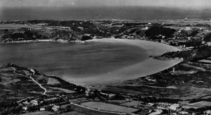 An Aerofilms aerial photograph showing Ouaisne in the foreground and St Brelade's Bay behind