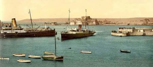 A boat arriving through the pierheads