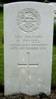 The grave of Great War casualty Osmand Touzel at Strand Military Cemetery, Belgium