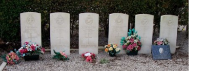 The communal grave at Fruges Communal Cemetery, shared by Nelson John de la Haye (third gravestone from left) and his flying colleagues