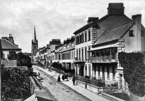 A photograph by George Bashford, probably taken in the late 1860s, making it a very old photograph of a St Helier street