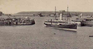 A steamer enters the harbour