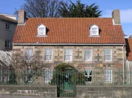 This fine granite house is at the Georgetown end of Don Road