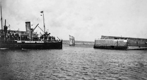 The harbourmouth with a steamship alongside Victoria Pier
