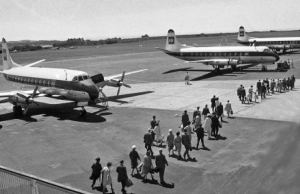 Passengers walk to their departing aircraft in 1962