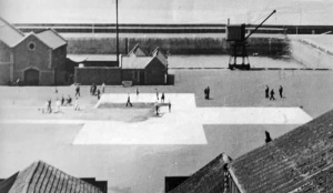 Painting of a white cross on the New North Quay