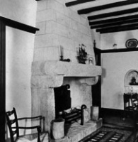 The fireplace restored and in its new home