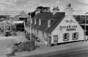 The original Union Inn, photographed in 1966, with the current Union Inn being built in the background