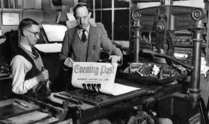 A poster advertising the day's edition is printed in 1950