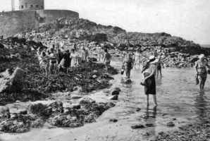 A visit by members of La Société Jersiaise while repair work was under way
