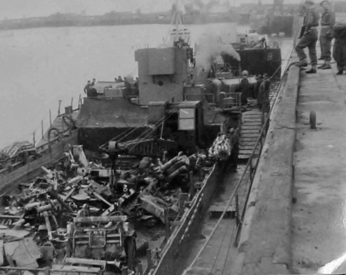 Loading a ship with weapons and ammunition ...