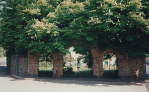The triple arch has had various styles of gates over the years - these in open metal work ....