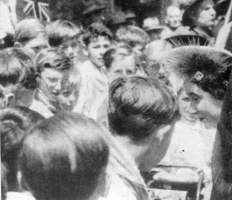 The Queen talks to excited islanders