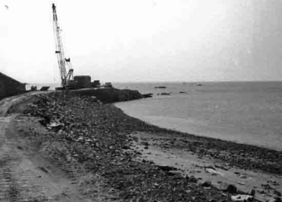 July 1973 - A crane is erected to manoeuvre the cobs into place