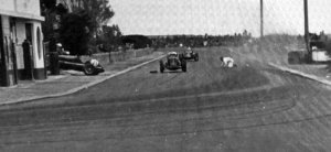 The injured driver in the road after the accident