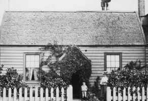 The first Picot family home in Wellington NZ. John Lionel Picot is standing in front with his mother Isabella