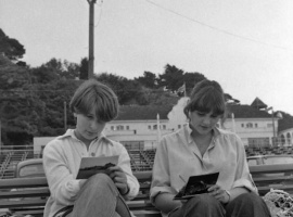 Sitting down on the promenade opposite West Park Pavilion to write postcards in 1978