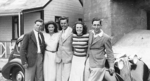 An unknown friend, Daphne Marsh, Philip and Madeleine Le Cuirot and Norman Foster with his Austin 14 c1947