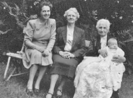 Four generations at the baptism of Brian Roger Ford Wilson: Florence Wilson, her mother Hilda Ford, and her grandmother Henriette Ford, née Folley with the baby